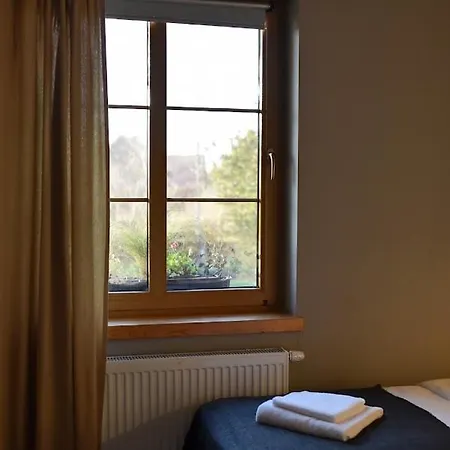 Gosciniec Szuwary Rum i privatbostad Krutyń